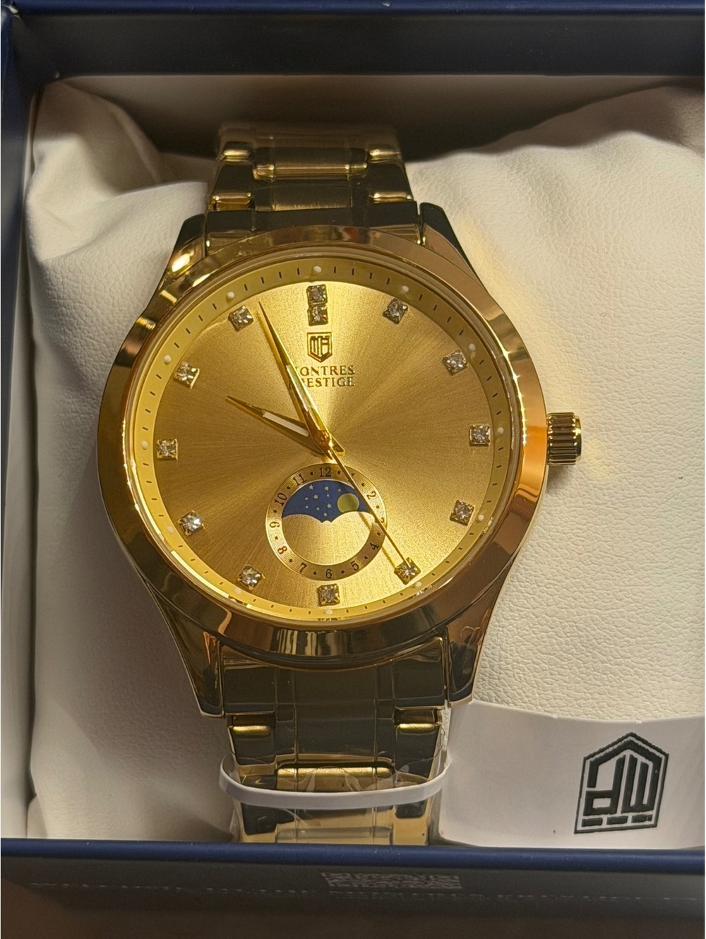 Montres Prestige gold-tone watch with moonphase dial
